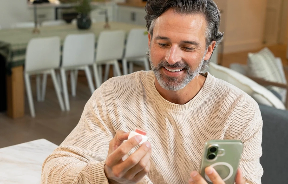 Man reviewing his lab results on his phone
