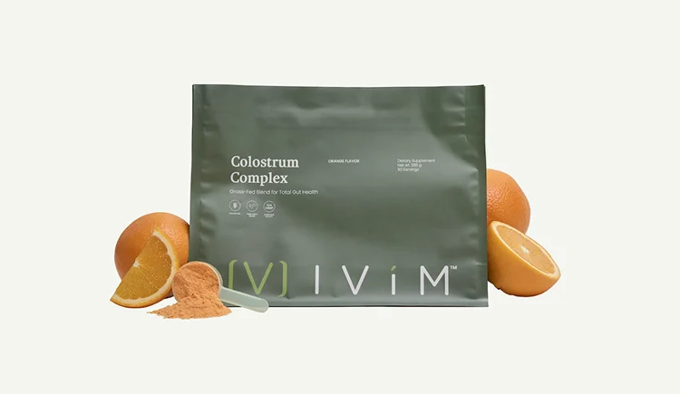 Ivim Colostrum Complex pouch with orange slices