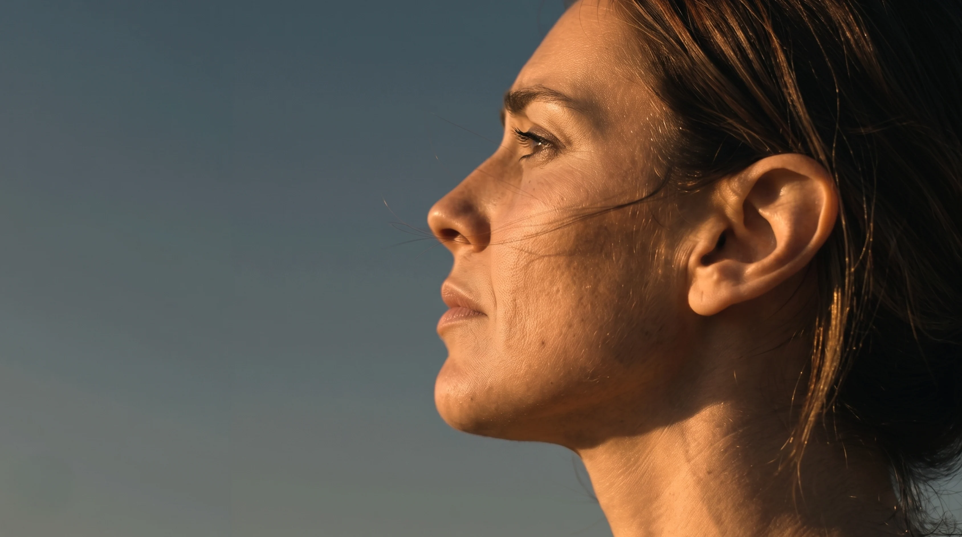 Woman in profile, backlit